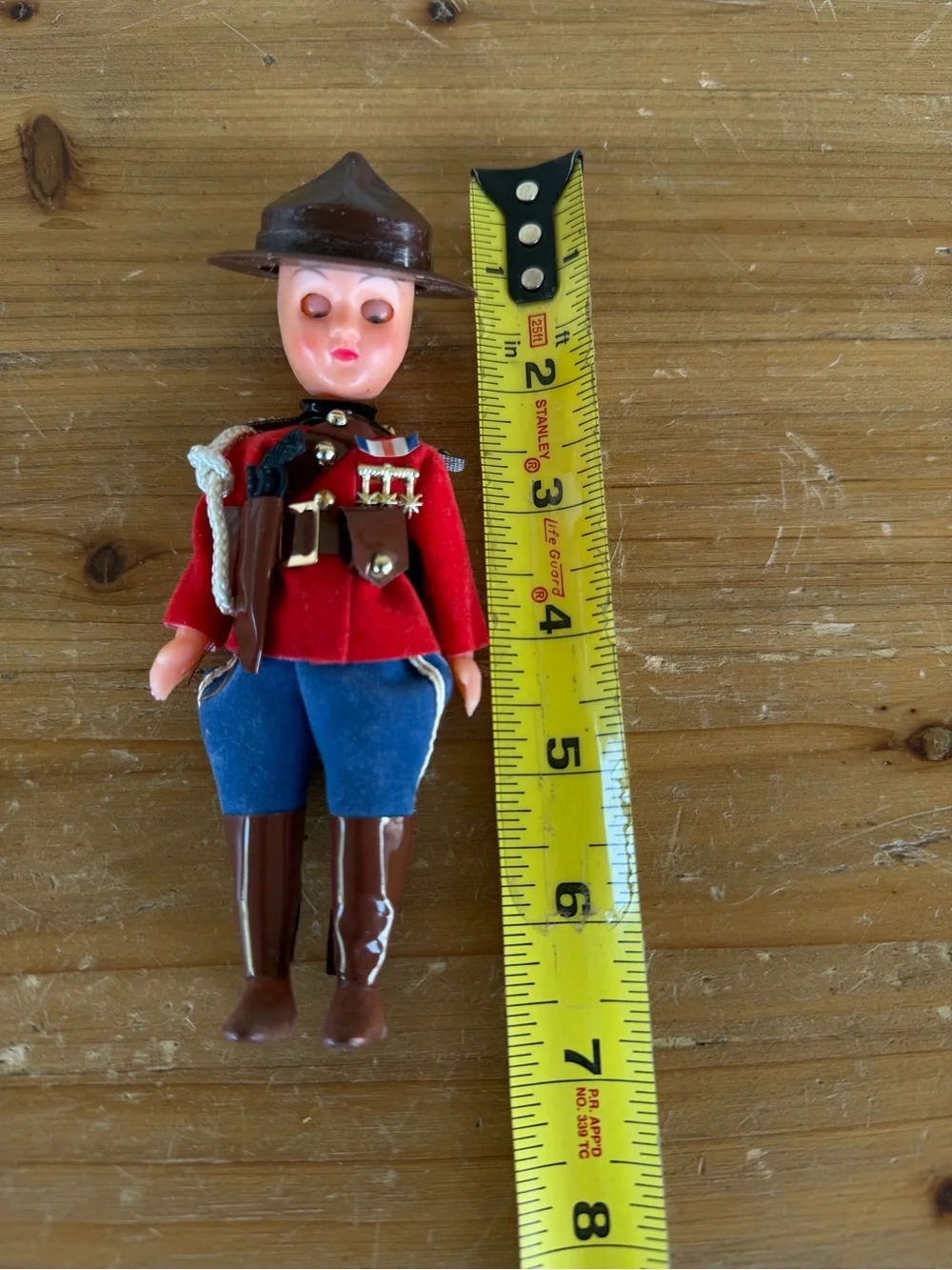 Vintage-Inspired Red Mountie Doll Toy with Blue Pants